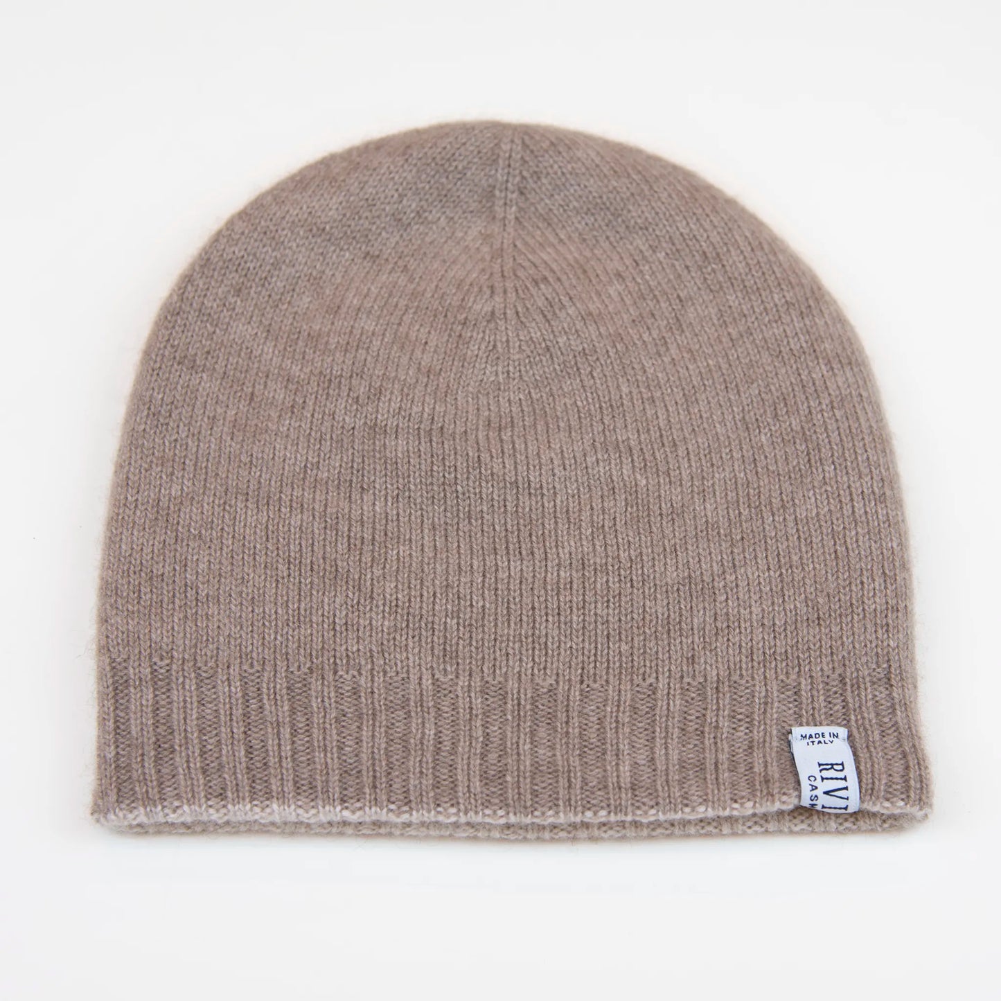 Cuffia doubleface beige e marrone in 100% Cashmere, Made in Italy. Pratica e versatile, può essere indossata con o senza risvolto. Trama rasata e pregiata manifattura per una vestibilità confortevole e di qualità.