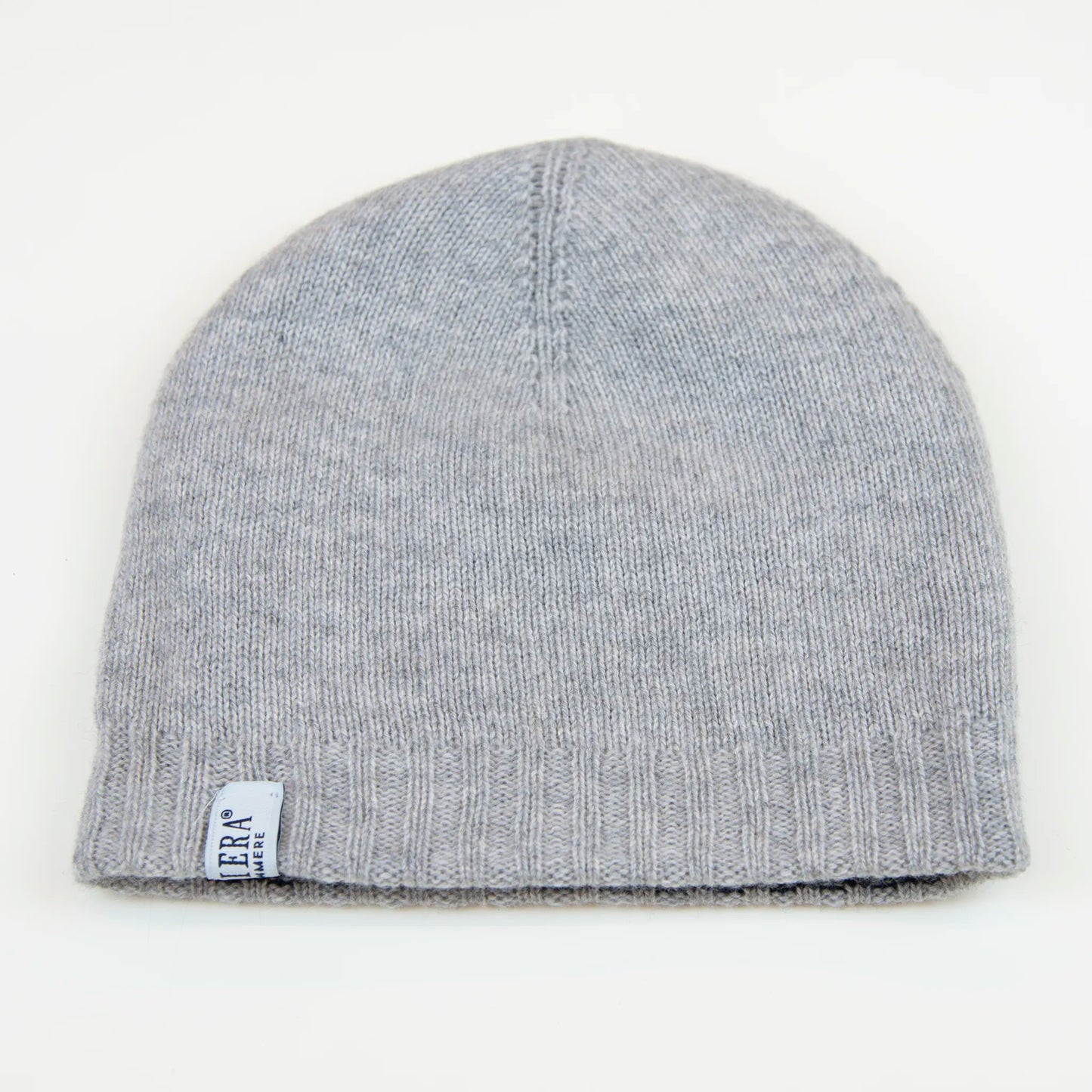 Cuffia doubleface grigio e blu in 100% Cashmere, Made in Italy. Pratica e versatile, può essere indossata con o senza risvolto. Trama rasata e pregiata manifattura per una vestibilità confortevole e di qualità.
