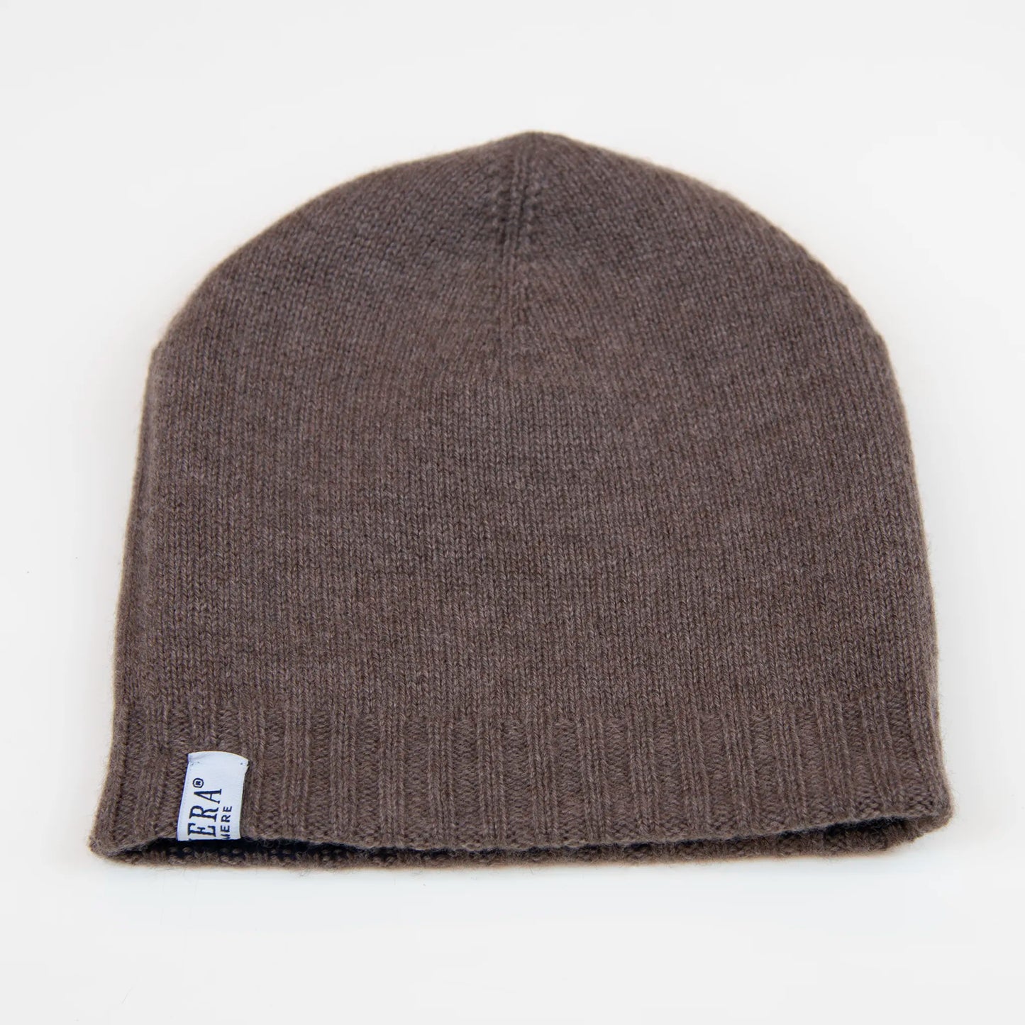 Cuffia doubleface marrone e blu in 100% Cashmere, Made in Italy. Pratica e versatile, può essere indossata con o senza risvolto. Trama rasata e pregiata manifattura per una vestibilità confortevole e di qualità.