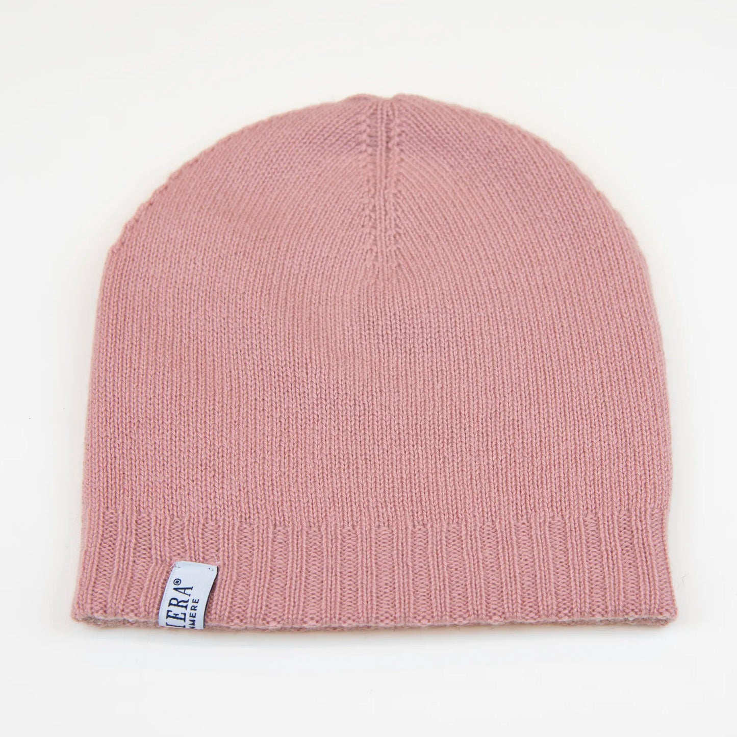 Cuffia doubleface rosa e panna in 100% Cashmere, Made in Italy. Pratica e versatile, può essere indossata con o senza risvolto. Trama rasata e pregiata manifattura per una vestibilità confortevole e di qualità.