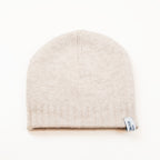 Cuffia doubleface beige e marrone in 100% Cashmere, Made in Italy. Pratica e versatile, può essere indossata con o senza risvolto. Trama rasata e pregiata manifattura per una vestibilità confortevole e di qualità.