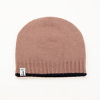 Cuffia doubleface blu in 100% Cashmere, Made in Italy. Pratica e versatile, può essere indossata con o senza risvolto. Trama rasata e pregiata manifattura per una vestibilità confortevole e di qualità.
