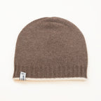 Cuffia doubleface beige e marrone in 100% Cashmere, Made in Italy. Pratica e versatile, può essere indossata con o senza risvolto. Trama rasata e pregiata manifattura per una vestibilità confortevole e di qualità.