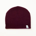 Cuffia doubleface Rosa e prugna in 100% Cashmere, Made in Italy, senza risvolto. Trama rasata e pregiata manifattura per una vestibilità confortevole e di qualità.