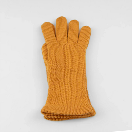 Guanto da donna senape in 100% Cashmere, morbido e confortevole, Made in Italy, con pregiata manifattura artigianale.