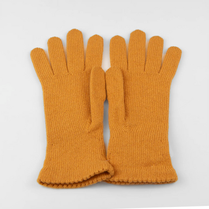 Guanto da donna senape in 100% Cashmere, morbido e confortevole, Made in Italy, con pregiata manifattura artigianale.