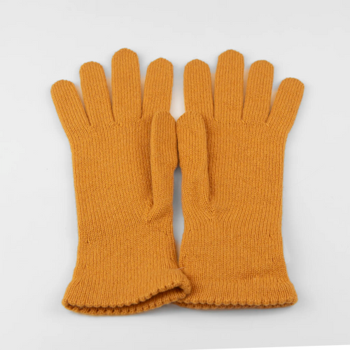 Guanto da donna senape in 100% Cashmere, morbido e confortevole, Made in Italy, con pregiata manifattura artigianale.