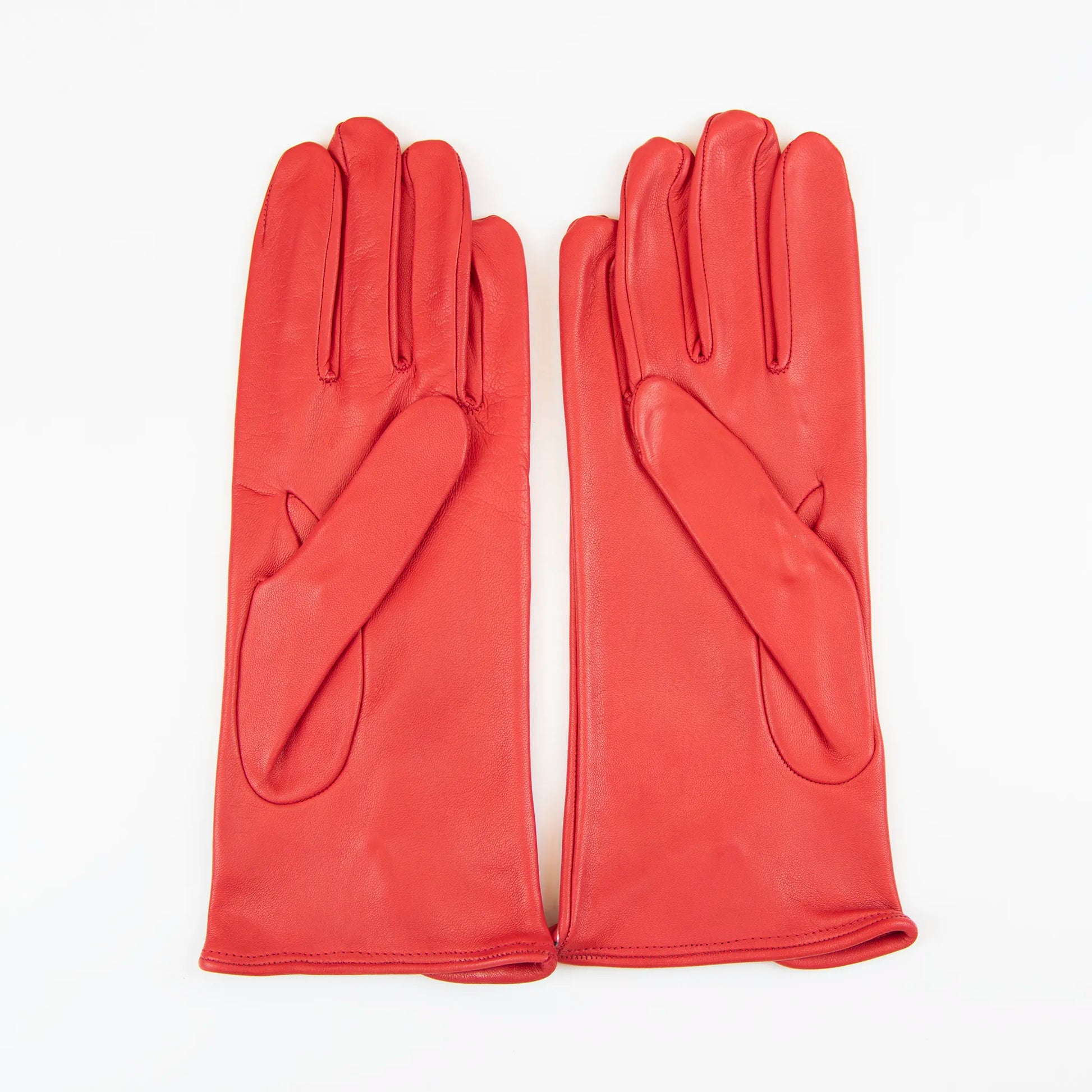 Guanto da donna rosso in 100% Nappa sfoderato, senza imbottitura, particolarmente confortevole e con perfetta calzata, Made in Italy.