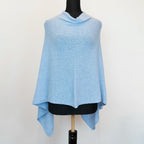 Mantellina in 100% cashmere celeste, Made in Italy, praticità e comfort con tre diverse vestibilità per ogni esigenza.