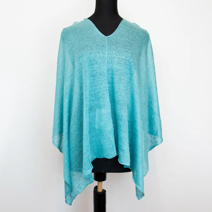 Mantellina in 100% Lino celeste, Made in Italy, praticità e comfort con tre diverse vestibilità per ogni esigenza.