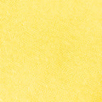 Dettagli e texture tessuto della mantellina in 100% Lino gialla, Made in Italy, praticità e comfort con tre diverse vestibilità per ogni esigenza.