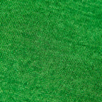 Dettagli e texture tessuto della mantellina in 100% Lino verde, Made in Italy, praticità e comfort con tre diverse vestibilità per ogni esigenza.