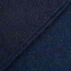 Sciarpa scaldacollo con asola in 100% Cashmere, con pattern virgola blu. Morbida, versatile e facile da indossare.