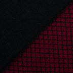 Sciarpa scaldacollo Jacquard double-face nero e bordeaux con asola in 100% Cashmere beige. Morbida, versatile e facile da indossare.