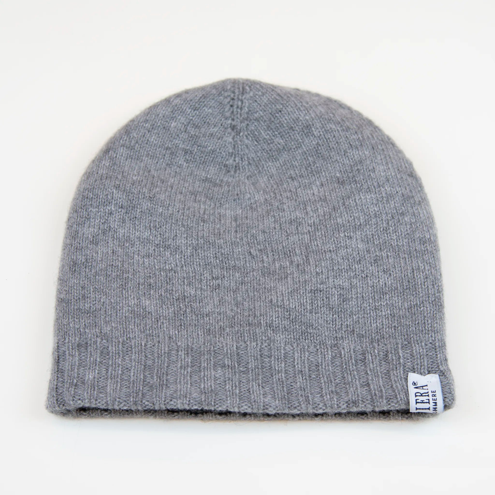 Cuffia doubleface grigio e nero in 100% Cashmere, Made in Italy. Pratica e versatile, può essere indossata con o senza risvolto. Trama rasata e pregiata manifattura per una vestibilità confortevole e di qualità.