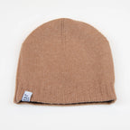 Cuffia doubleface marrone e beige in 100% Cashmere, Made in Italy. Pratica e versatile, può essere indossata con o senza risvolto. Trama rasata e pregiata manifattura per una vestibilità confortevole e di qualità.