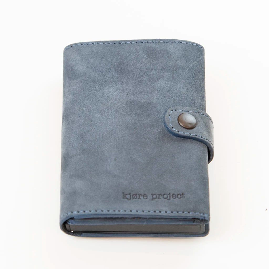 Portafoglio compatto in pelle blu Made in Italy, artigianale, con scomparto carte automatico, molla porta banconote e porta monete.