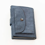 Portafoglio compatto in pelle blu Made in Italy, artigianale, con scomparto carte automatico, molla porta banconote e porta monete.