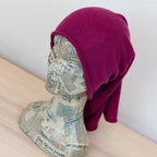 Collo in 100% cashmere viola, versatile, utilizzabile come scaldacollo, fascia per capelli, passamontagna o cappello con sbuffo, Made in Italy, morbido e caldo.