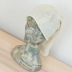 Collo in 100% cashmere panna, versatile, utilizzabile come scaldacollo, fascia per capelli, passamontagna o cappello con sbuffo, Made in Italy, morbido e caldo.